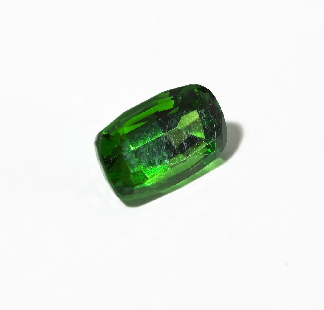 1.82 Carat Mixed Cushion Cut Tsavorite: DESCRIPTION: 1.82 carat mixed cushion cut tsavorite. In original box with GIA Gem Trade Laboratory report. CONDITION: No defects noted.