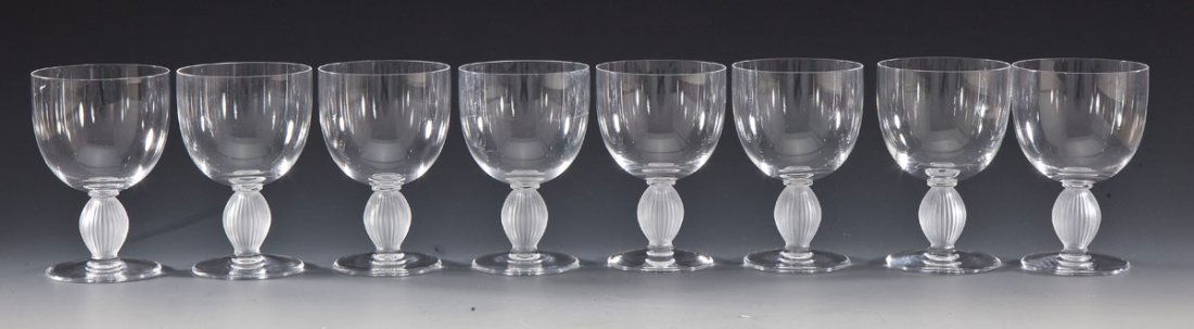 8 Langeais Pattern Lalique Wine Glasses: DESCRIPTION: Eight Lalique burgundy wine glasses in the Langeais pattern. Signed for Lalique upon the base. MEASUREMENTS: 5-1/4" x 3-3/8". CONDITION: No defects noted.