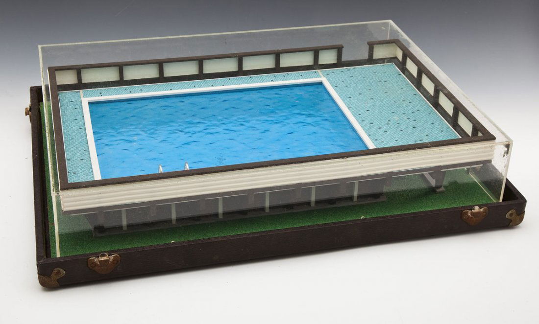 Salesman's Sample Above Ground Swimming Pool: DESCRIPTION: Salesman's sample above ground swimming pool. "The Smiths" on side of pool. Circa 1950's or 1960's. In hard case. MEASUREMENTS: 24-3/4" x 19" x 5-1/2". CONDITION: Minor wear to surface co