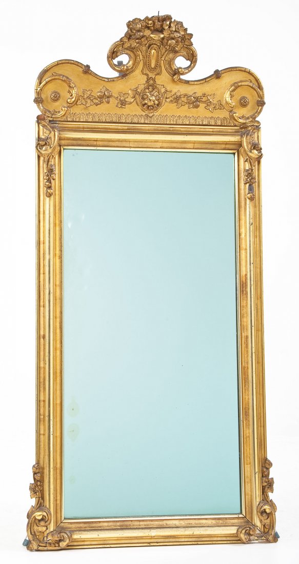 Victorian Gilded Pier Glass: DESCRIPTION: A Victorian pier glass consisting of a mixed wood frame with applied gesso and gilded Renaissance Revival decoration. With an early label for "James Fryer's Emporium of Art/206 W. Baltimo