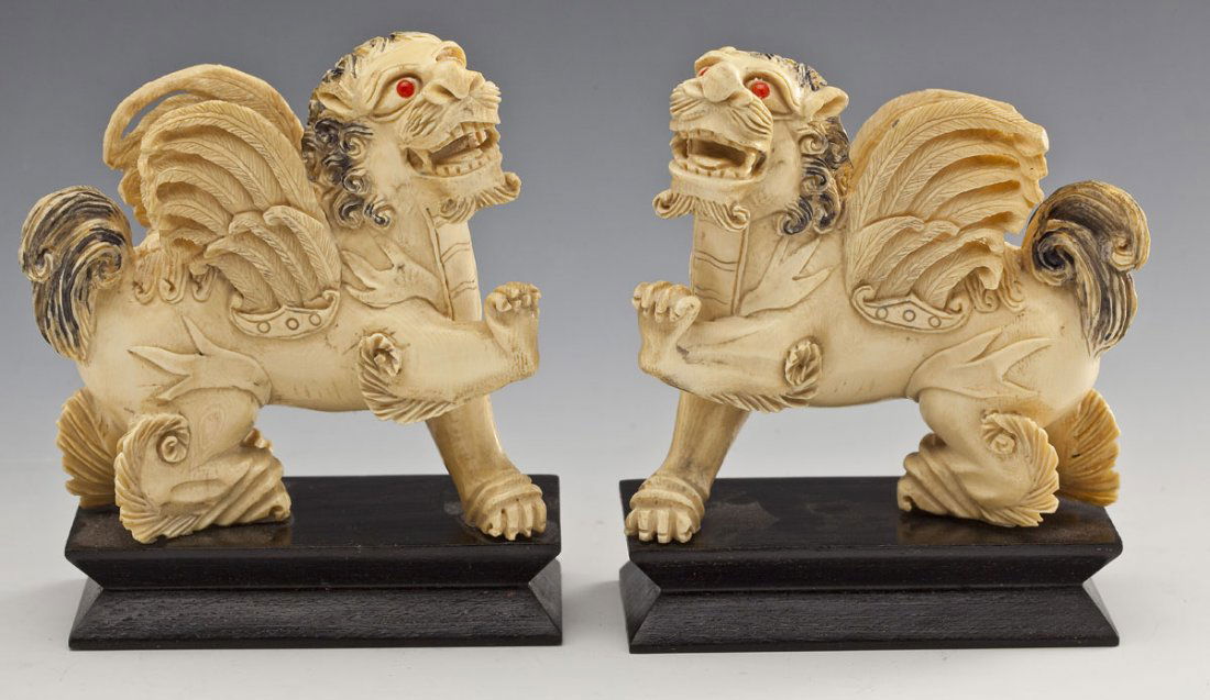 Pair of Carved Ivory Winged Foo Lions (1 of 5)