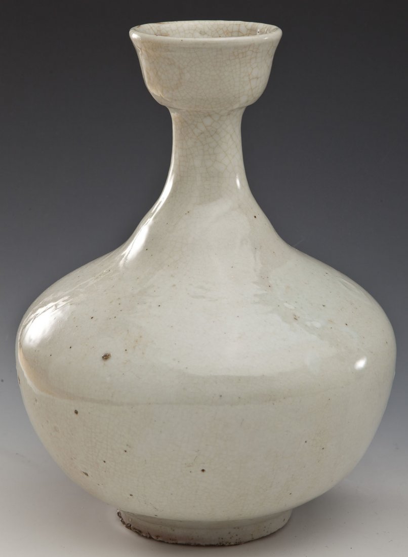 Korean Wine Bottle: DESCRIPTION: Korean wine bottle. Possibly 18th century. Pale glaze. MEASUREMENTS: 10-1/2" x 8" at widest point. CONDITION: Minor crazing to surface consistent with age. Minor dark hairline to lip. Rou