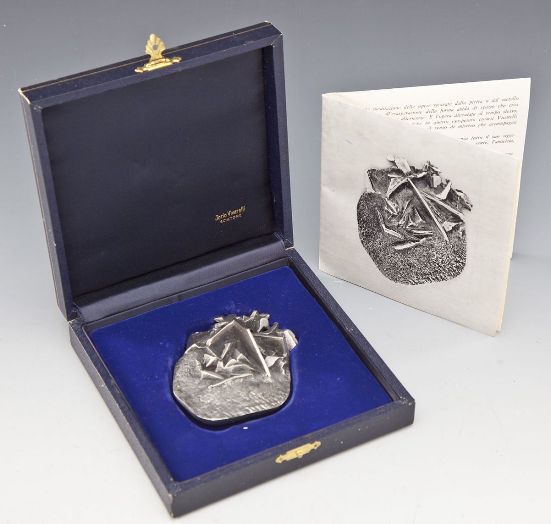 Jorio Vivarelli (Italy, Born 1922): DESCRIPTION: Jorio Vivarelli (Italy, Born 1922). Metallic sculpture. Marked upon the base. Numbered upon the base 103/150. Housed in a fitted case with the exposition card. MEASUREMENTS: 3-1/2" x 2-3/