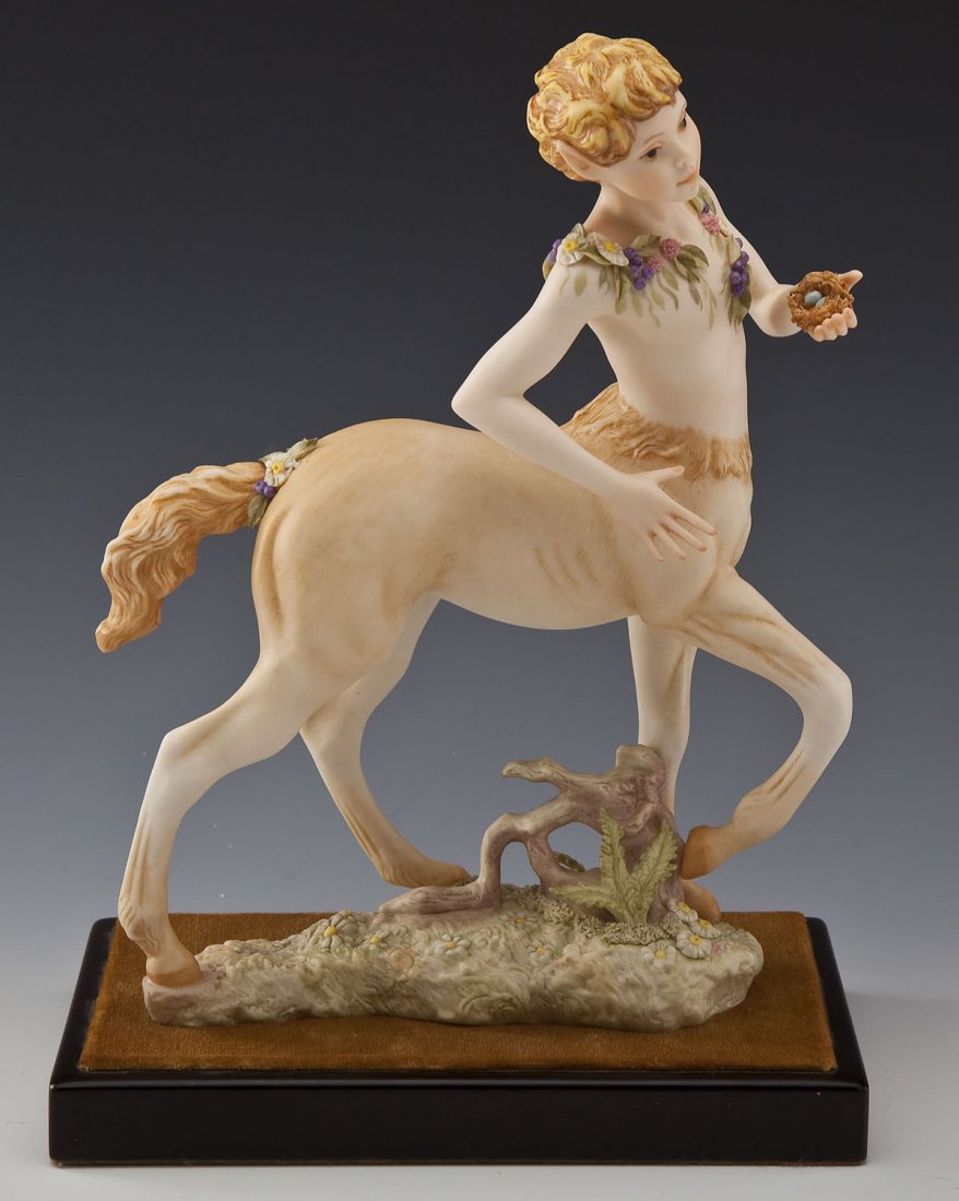 Theron, The Hunter Cybis Sculpture: DESCRIPTION: Theron, The Hunter Cybis sculpture attached to composite base with mustard-colored velvet. PROVENANCE: From the collection of Lynn Brown, Cybis sculptor at Cybis Art Studio in Trenton, Ne