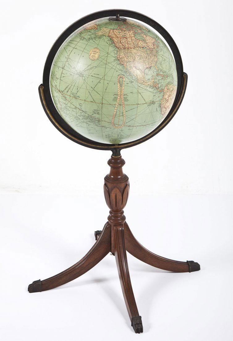 Library Globe: DESCRIPTION: Library globe on Duncan Phyfe style wooden stand. Replogle Globes Inc., Chicago. MEASUREMENTS: 16" globe. 39" high overall. CONDITION: Two areas of pinprick loss on globe and one small 1/