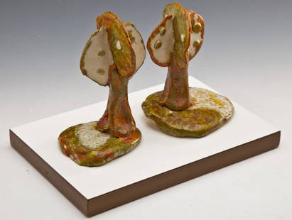 Richard DeVore (American, 1933-2006): DESCRIPTION: Richard DeVore (American, 1933-2006). Early experimental ceramic sculpture with polychrome glazes on wood and formica base. Two Trees. PROVENANCE: Private collection. Acquired directly fr