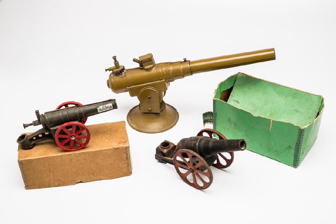 3 Big Bang Cast Iron Guns incl. Anti-Aircraft: DESCRIPTION: Three Big Bang cast iron guns. Includes: 1) No. 15 Anti-Aircraft gun with original box and instructions. 16-1/2" long. 2) Big Bang Field Cannon. 9-1/2" long. 3) Big Bang light field gun i
