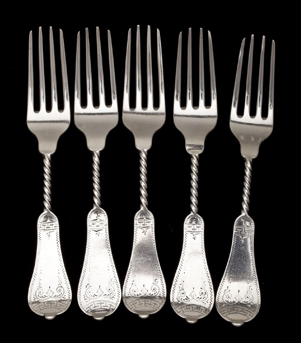 5 Duhme Coin Silver Luncheon Forks: DESCRIPTION: Five Duhme coin silver luncheon forks. Pattern 1869 No. 1. Each with a twisted handle ending with an engraved pattern. Each marked for Duhme upon the reverse. Duhme & Co was established i
