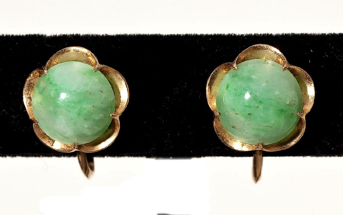 14K Jadeite Screwback Earrings: DESCRIPTION: Marked 14K rose gold flower form screwback earrings, marked "K14" and each set with approx. 9mm jadeite cabochon. MEASUREMENTS: 2.8 dwt (4.4 gr). CONDTION: Very light wear as expected.