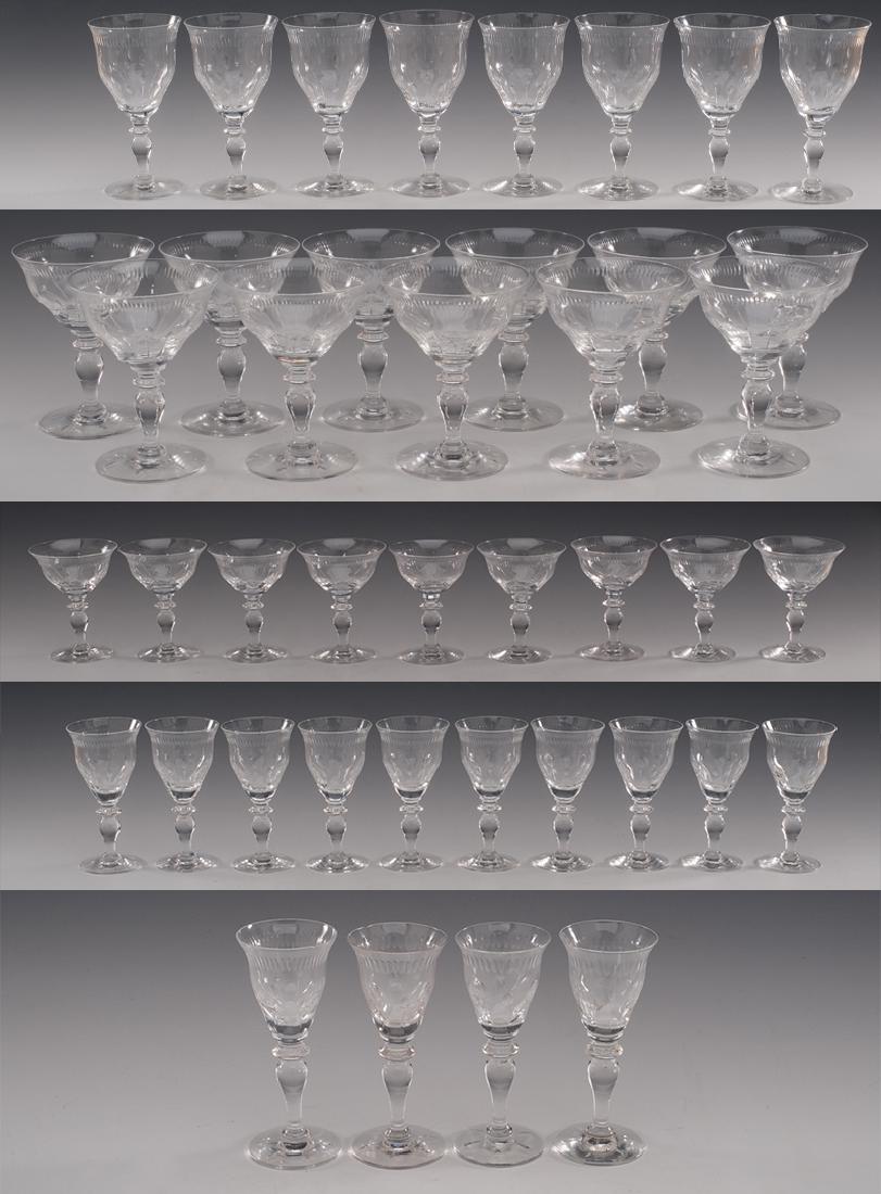 42 Pcs Hawkes Dawn Stemware: DESCRIPTION: Forty-two pieces of Hawkes stemware in the Dawn pattern. Includes: four 4-1/2" cordials, ten 5-1/8" wine glasses, nine 4-3/8" liquor cordials, eleven 5" champagne/tall sheberts, and eight