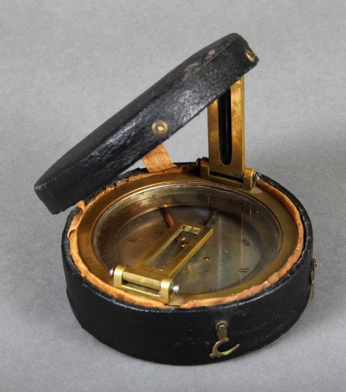 A Fine Cased Brass Compass: Antique, having a brass case, apparently unmarked, possibly American, in fitted paste board and wood case, 4.125"D, circa 19th century. Condition: This compassis not in working order.