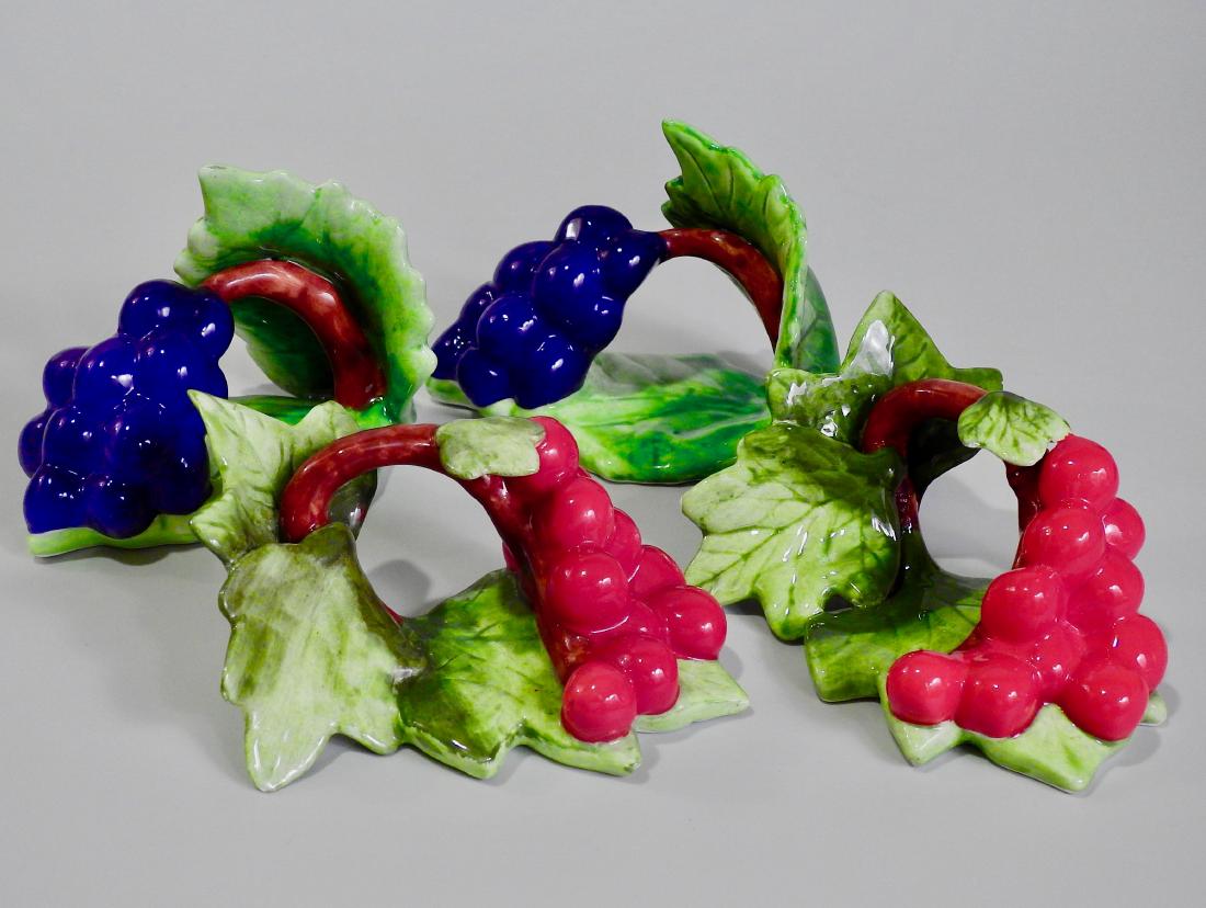 Colorful Ceramic Fruits Napkin Rings Lot of 4: Colorful Ceramic Fruits Napkin Rings Lot of 4 Approximately 4 7/8 x 3 x 2 3/8 inches.