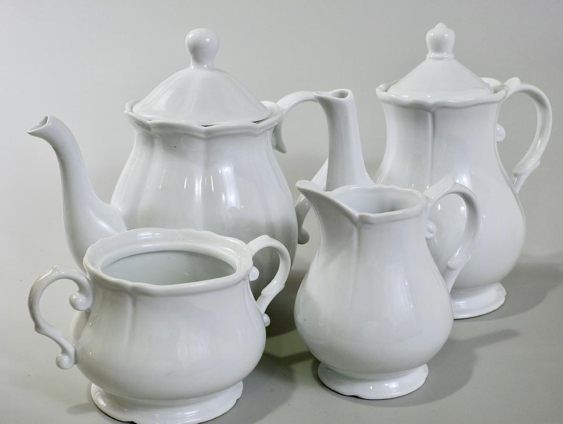 White Blanc De Chine Tea Coffee Set Creamer Sugar Lot: White Blanc De Chine Tea Coffee Set Creamer Sugar Lot Creamer is approximately 4 7/8 inches tall; sugar 6 1/4 x 4 1/2 x 5 3/8 inches; pots are about 8 1/4 inches tall.