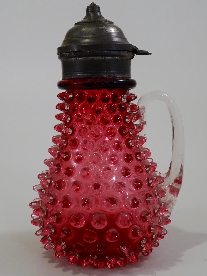 Hobbs Brockunier Cranberry Glass Jar Hobnail Syrup Jug: Hobbs Brockunier Cranberry Glass Jar Hobnail Syrup Jug Antique c19 Century Approximately 6 13/16 inches tall.