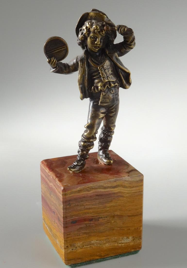 Italian Antique Bronze Boy with Tambourine Figurine: Italian Antique Bronze Boy with Tambourine Figurine Approximately 6 1/8 inches tall.