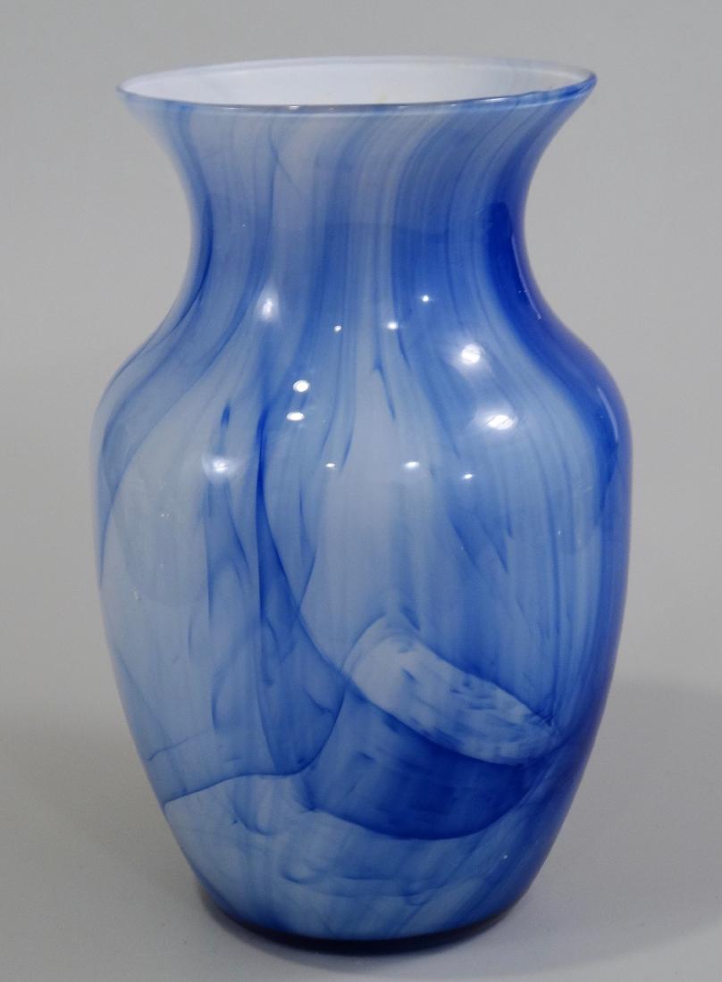Blue White Art Glass Flower Vase: Blue White Art Glass Flower Vase Approximately 8 inches tall and 4 1/4 inches in diameter.