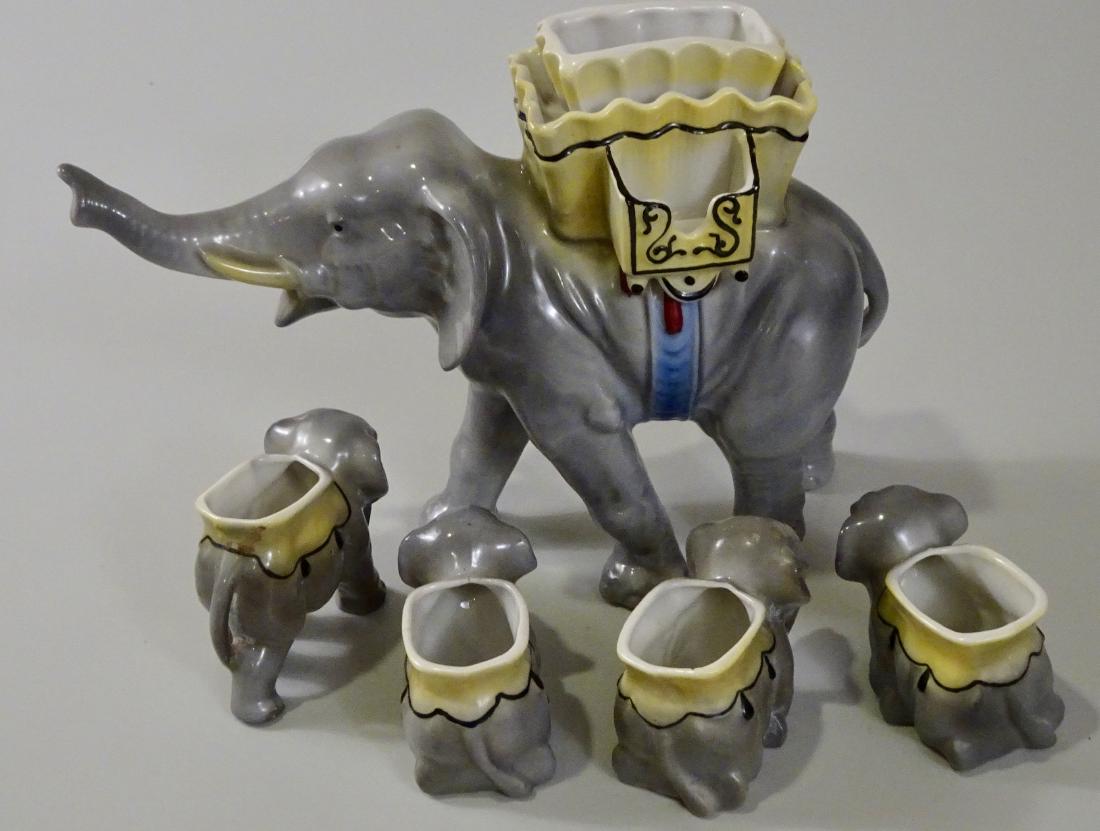 Vintage German Elephant Cigarette Stand Ashtray Set: Vintage German Elephant Cigarette Stand Ashtray Set Bavaria Elephant cigarette stand is approximately 5 3/4 x 8 1/8 x 3 inches; ashtrays are from 2 to 2 1/4 inches tall.