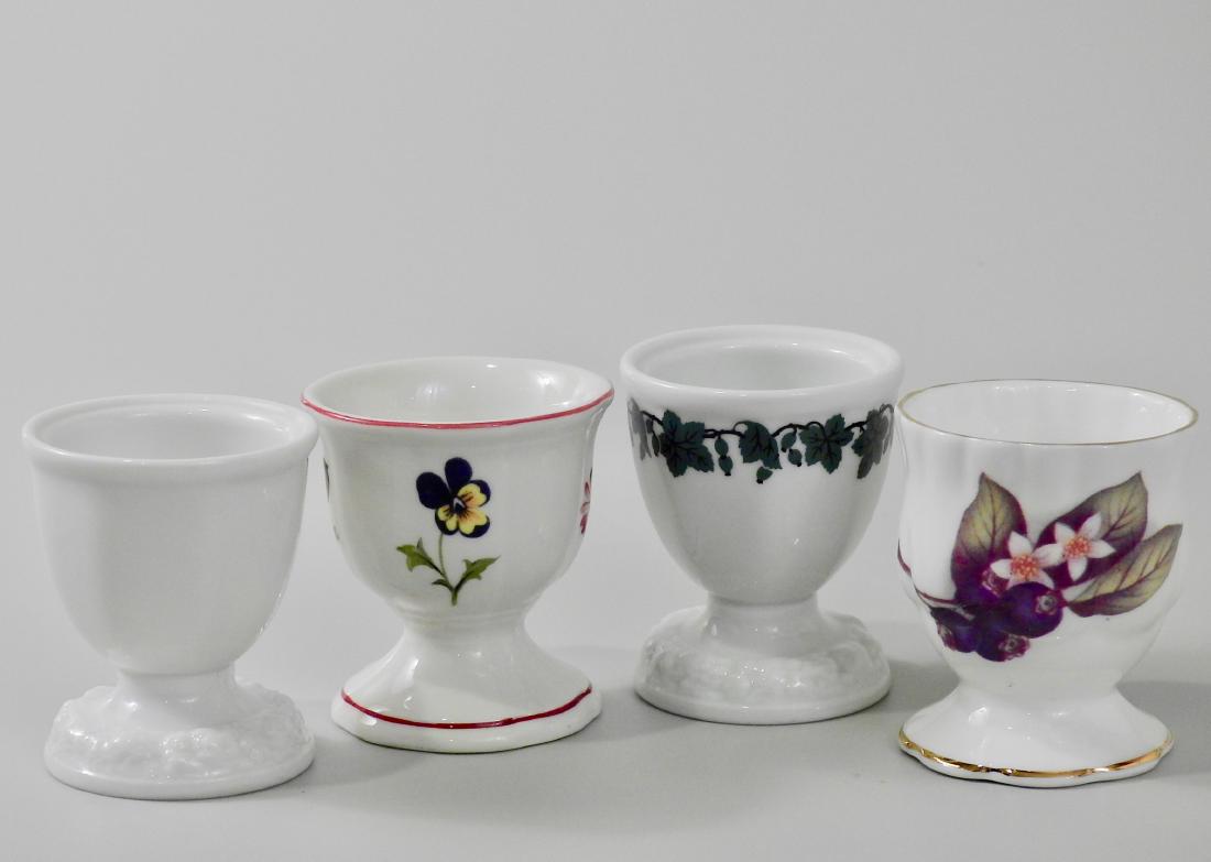 Lot of 4 Egg Serving Cups Villeroy and Boch English: Lot of 4 Egg Serving Cups Villeroy and Boch English Bone China German Maria etc. Approximately 2 3/16 inches tall.