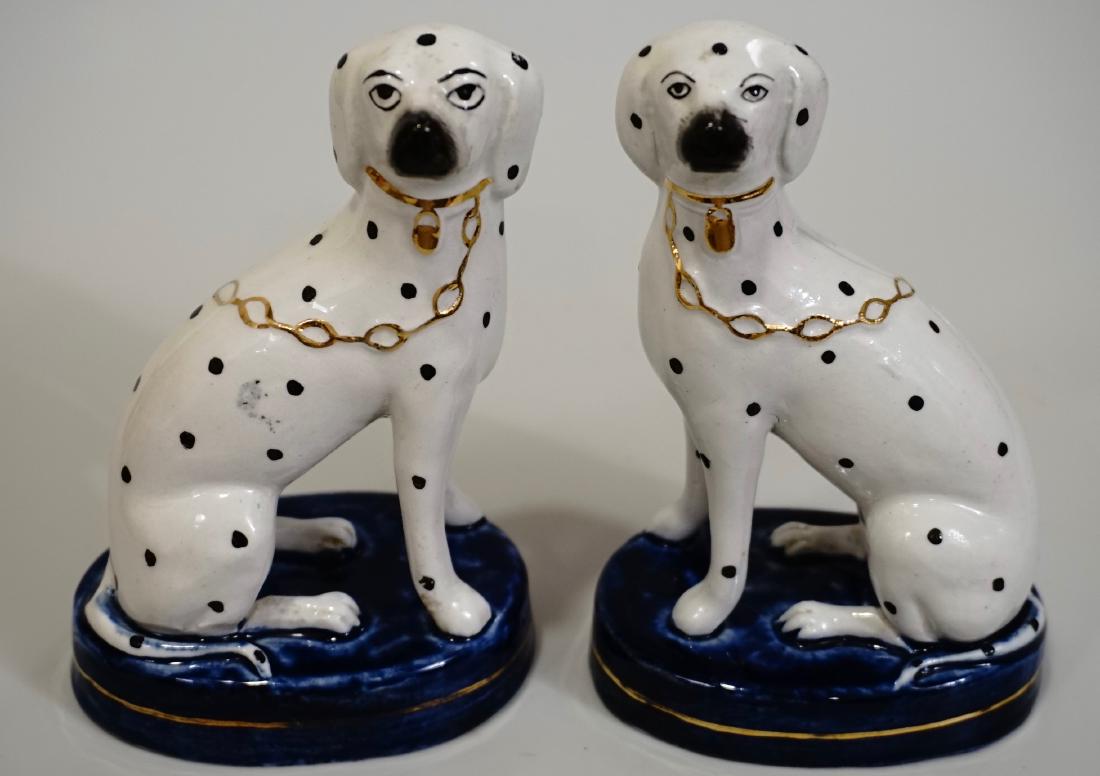 Dalmatian Dog Staffordshire Ware England Pair: Dalmatian Dog Staffordshire Ware England Pair Pair of Staffordshire Dogs Glazed Earthenware Sitting Dalmatians Cobalt Blue Base Approximately 3 5/16 x 2 1/4 x 5 3/16 inches tall.