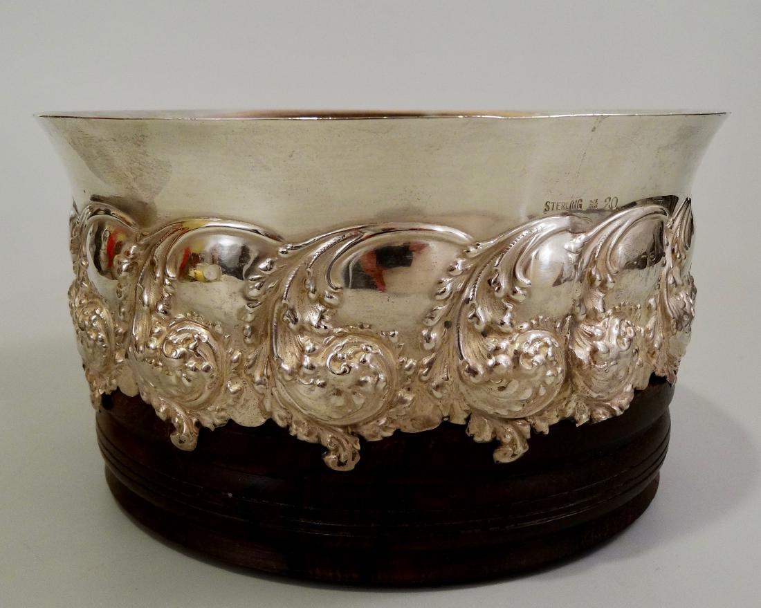 Wine Champagne Sterling Silver Bottle Coaster Unique: Wine Champagne Sterling Silver Bottle Coaster Unique Rosewood Carved Swan Base Mounted as a Wall Plaque Approximately 3 1/2 x 6 5/8 inches in diameter.