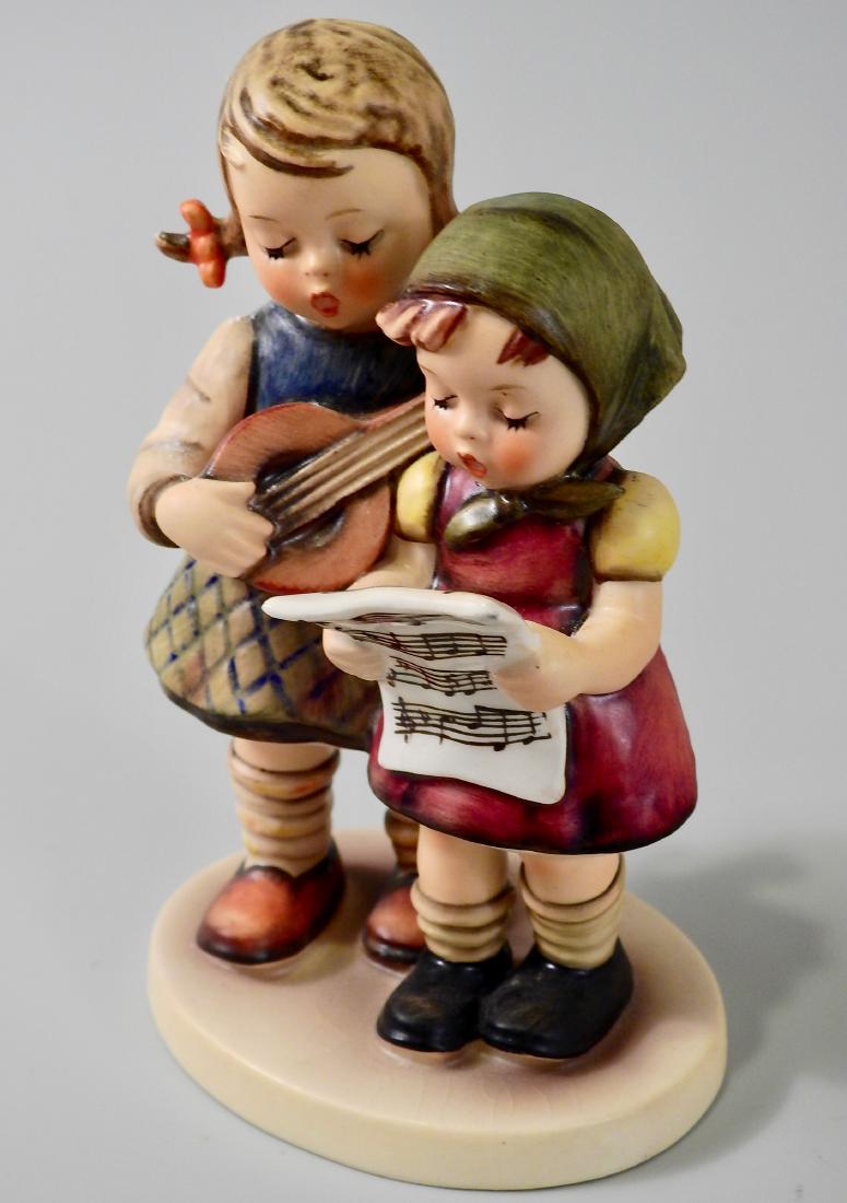 Goebel West Germany Singers Figurine: Goebel West Germany Singers Figurine Approximately 5 1/4 inches tall.