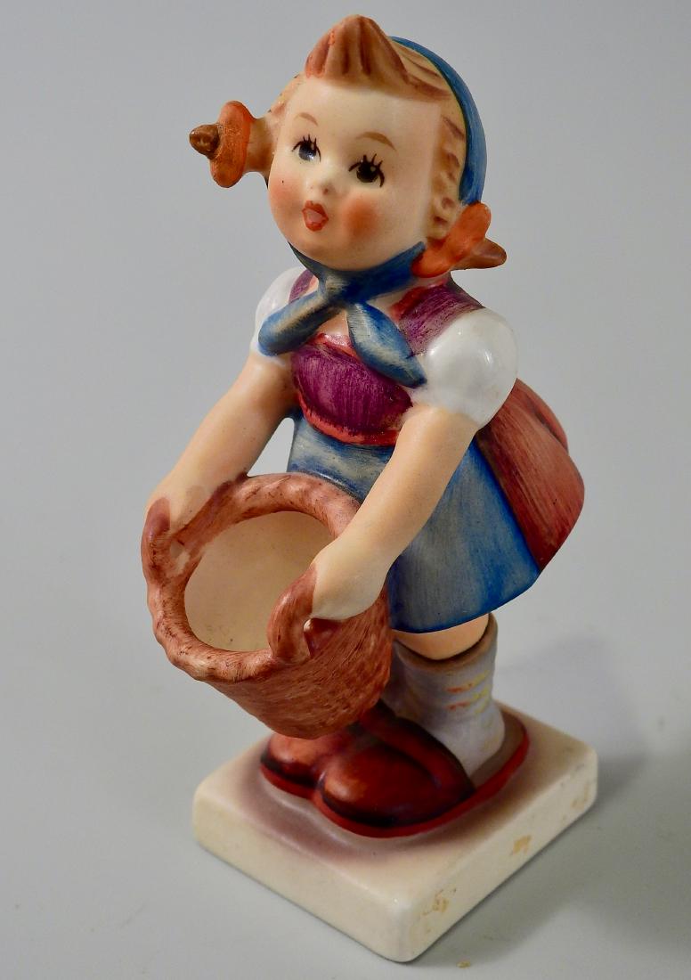 Goebel West Germany Girl With Basket Figurine: Goebel West Germany Girl With Basket Figurine Approximately 4 1/4 inches tall.