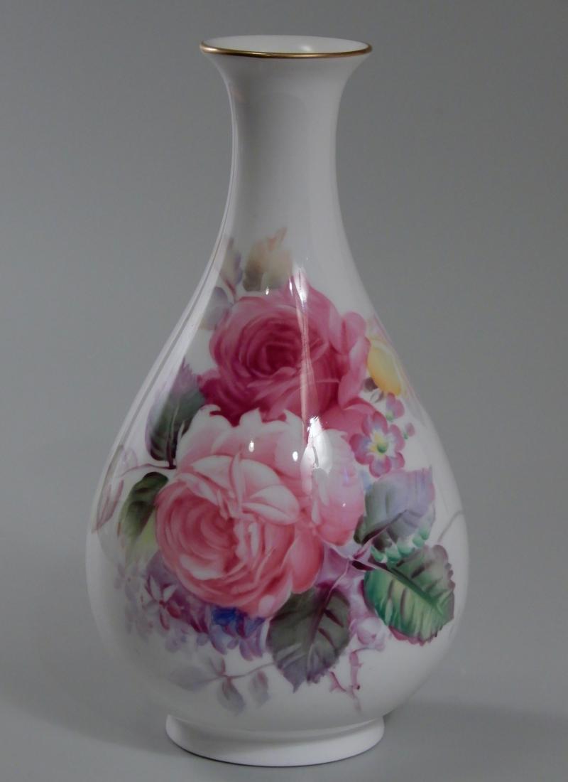 Nippon Noritake Artist Signed Finely Painted Roses: Nippon Noritake Artist Signed Finely Painted Roses Porcelain Vase Approximately 6 5/8 inches tall x 4 inches in diameter.