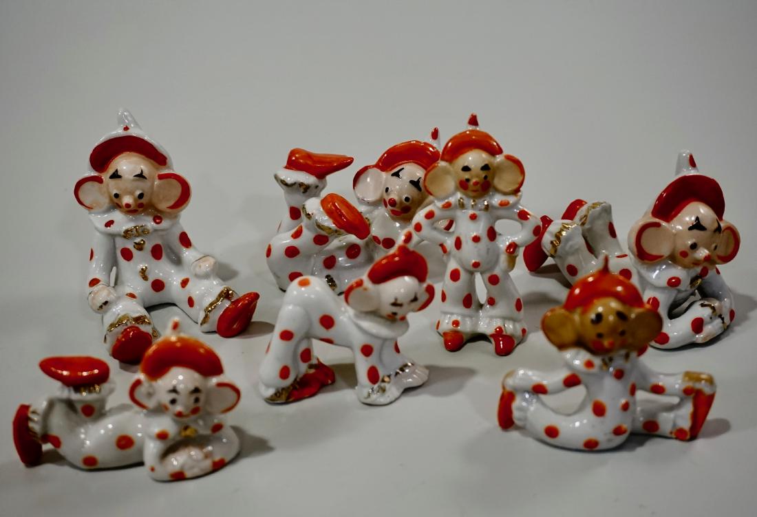 Lot of 7 Humorous Big Ear Clown Figurine c1930 Made in: Lot of 7 Humorous Big Ear Clown Figurine c1930 Made in Japan Collection Various Sizes Approximately from 2 1/16 to 3 3/8 inches tall.