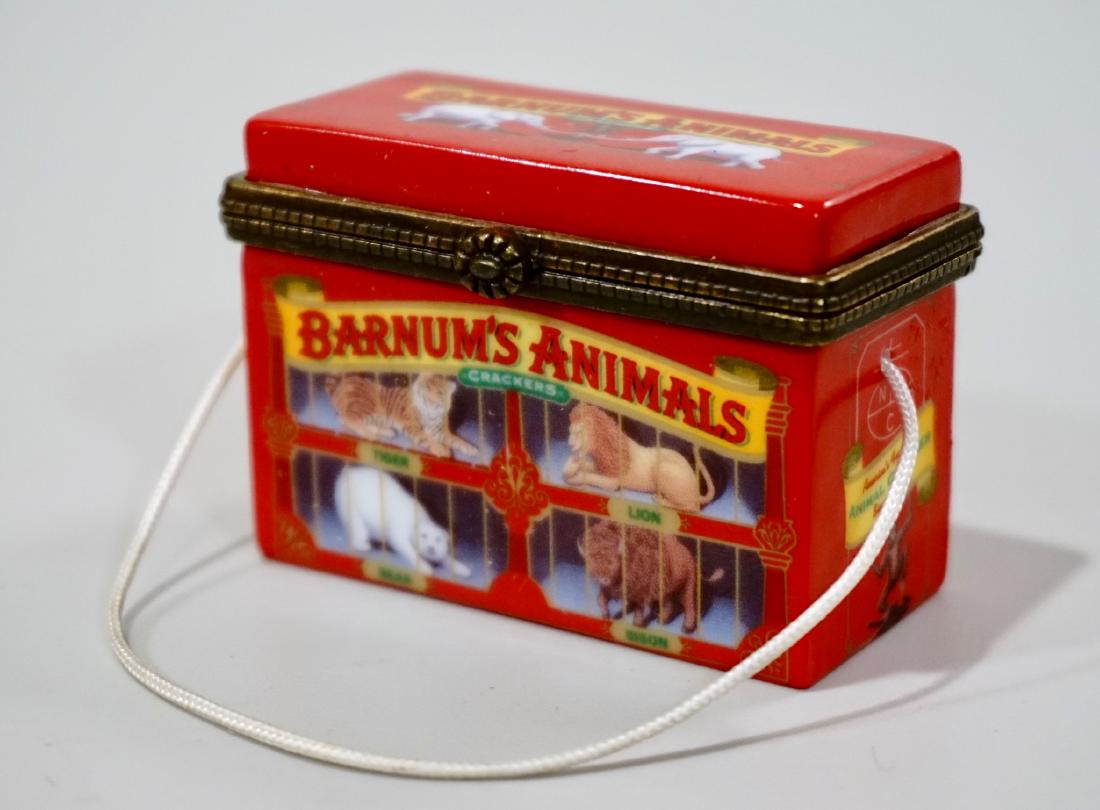 Barnum's Circus Porcelain Pill Box Nabisco Animals: Barnum's Circus Porcelain Pill Box Nabisco Animals Crackers Surprize Elephant Inside Miniature Designed by Midwest Cannon Falls Marked TM & Nabisco Approximately 2 7/16 x 1 3/8 x 1 13/16 inches.