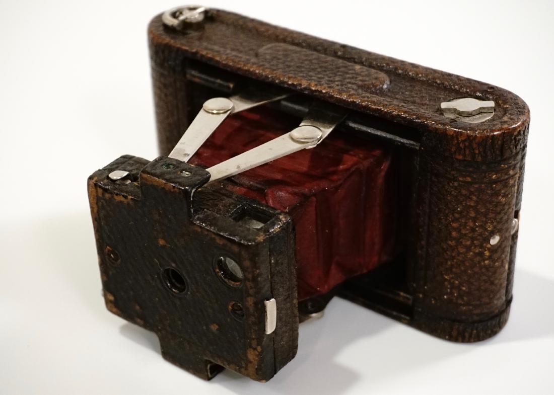 No 0. Folding Pocket Kodak Model A-B Photo Camera: No 0. Folding Pocket Kodak Model A-B Photo Camera Designed by Frank Brownell 105 roll film folding camera was produced by Eastman Kodak Co. Ltd., from 1897 to 1898. Back than with average $1.15/day wa