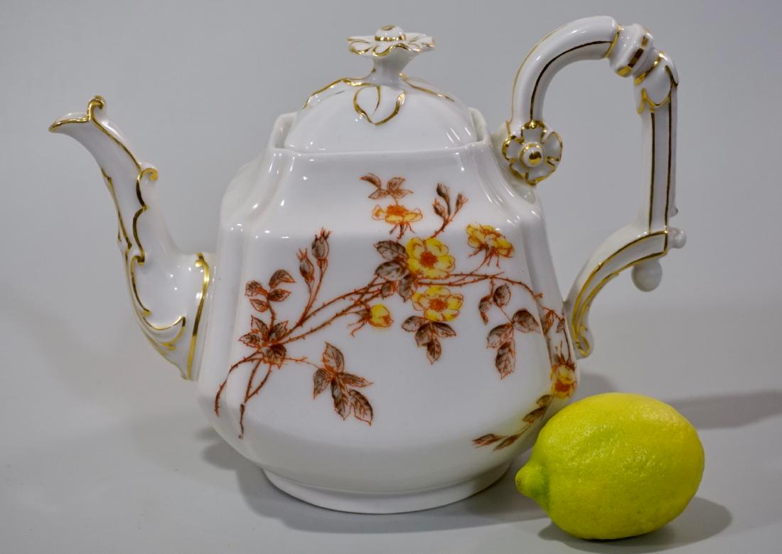 Victorian Aesthetic Porcelain Teapot c 1900 Nathan: Victorian Aesthetic Porcelain Teapot c 1900 Nathan Dohrmann San Francisco Retailer Marks Approximately 8 7/8 x 5 3/8 inches and 6 5/8 inches tall.