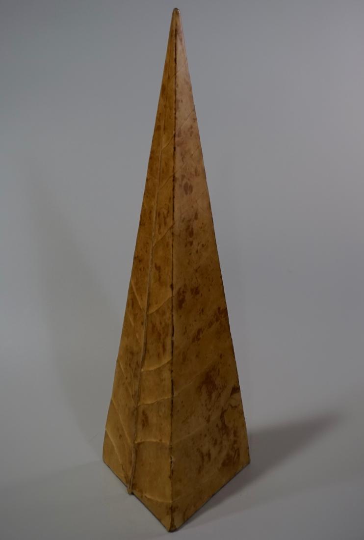 Tobacco Leaf Obelisk: Tobacco Leaf Obelisk Tobacco leaf wrapped obelisk approximately 18 1/4 inches tall and 6 1/8 inches wide.