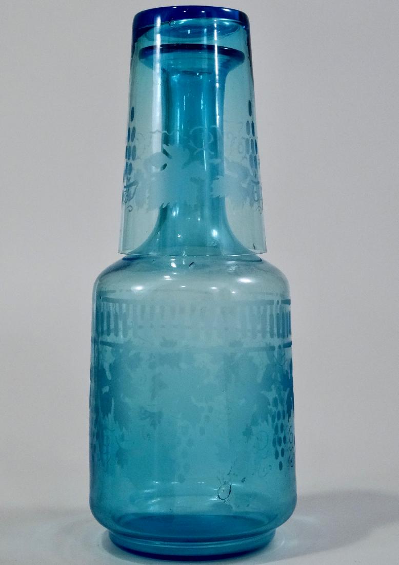Vintage Grape Motif Blue Glass Bedside Decanter Tumble: Vintage Grape Motif Blue Glass Bedside Decanter Tumble Up Carafe Approximately 10 1/8 inches tall.