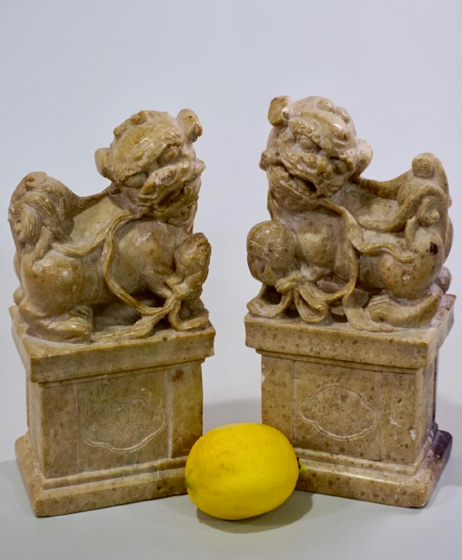 Carved Stone Foo Dogs Fu Lions Bookends Pair Chinese: Carved Stone Foo Dogs Fu Lions Bookends Pair Chinese Carvings Approximately 3 5/8 x 2 3/8 x 7 1/2 inches tall each.