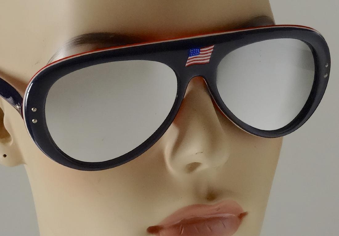 Iconic Martin SNO Ski Aviator Vintage 70s Skiing Resor: Iconic Martin SNO Ski Aviator Vintage 70s Skiing Resort Three Color Plastic Sunglasses Mirrored Lens USA Team Flag Made in Japan Approximately 7 7/8 wide x 5 1/4 inches.