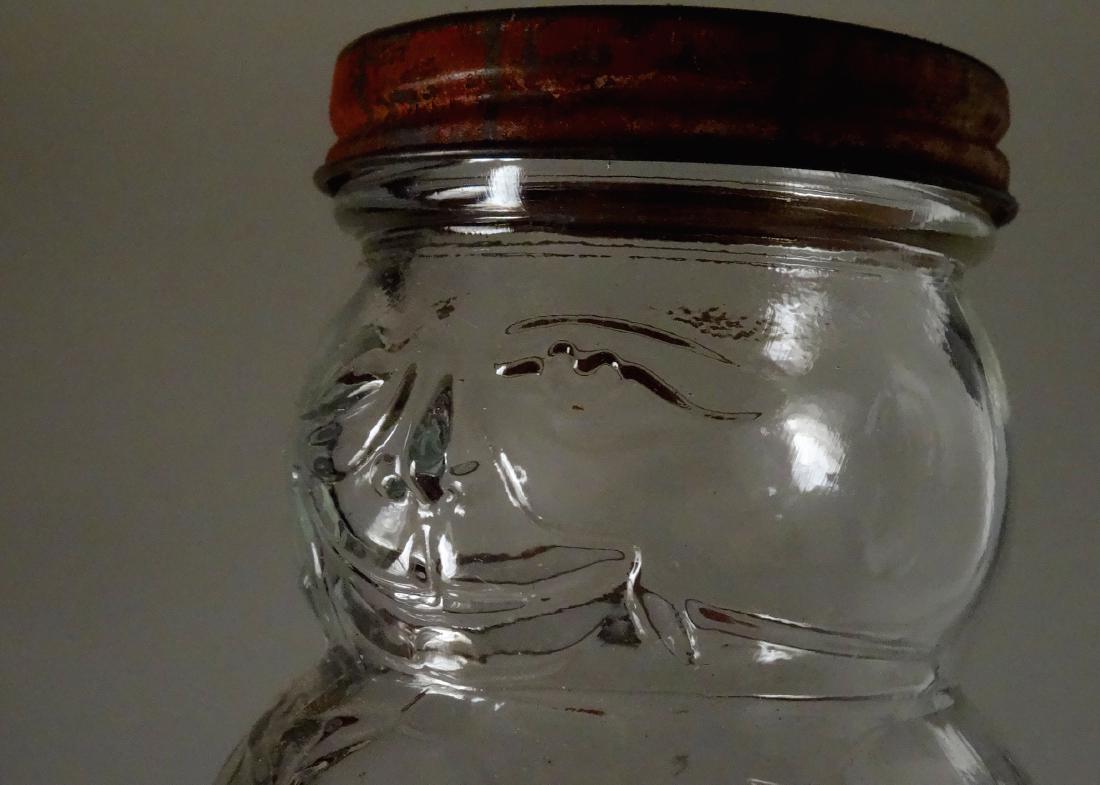 Vintage Character Figural Glass Tilting Jar Sun-Ra Hot: Vintage Character Figural Glass Tilting Jar Sun-Ra Hot Dog Sauce 1940s It can stand upright or tipped forward. Approximately 4 1/4 inches.