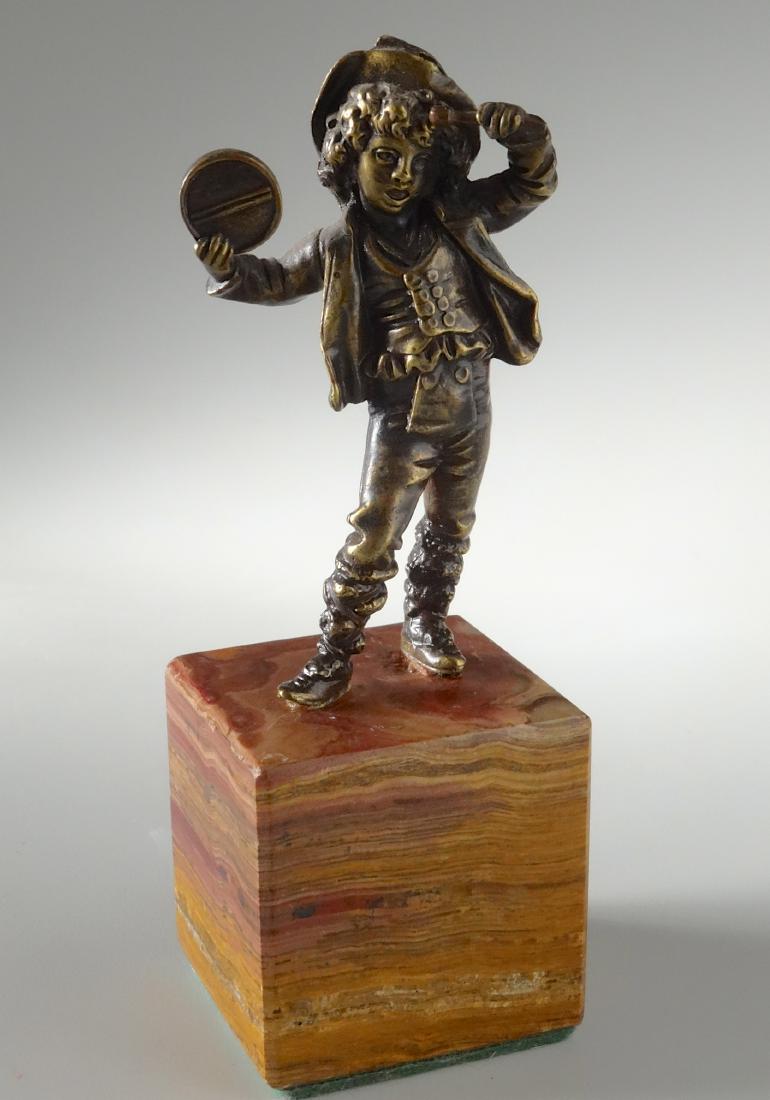 Italian Antique Bronze Boy with Tambourine Figurine: Italian Antique Bronze Boy with Tambourine Figurine Approximately 6 1/8 inches tall.