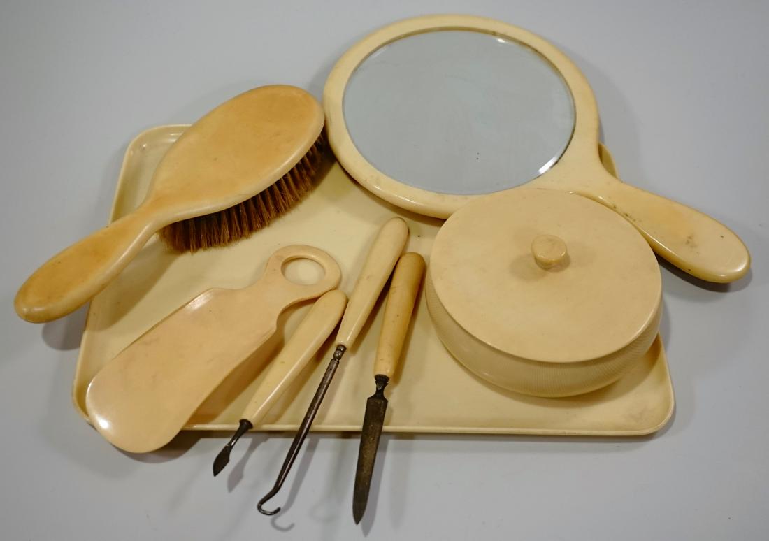 Pyralin Ivory Vanity Set: Pyralin Ivory Vanity Set Tray is 11 7/16 x 8 3/8 ; Mirror 10 3/4 x 6 5/8; Round Box 2 1/4 x 4 1/2 ; Brush 8 3/8; miscellaneous tools from 5 1/8 to 7 7/8