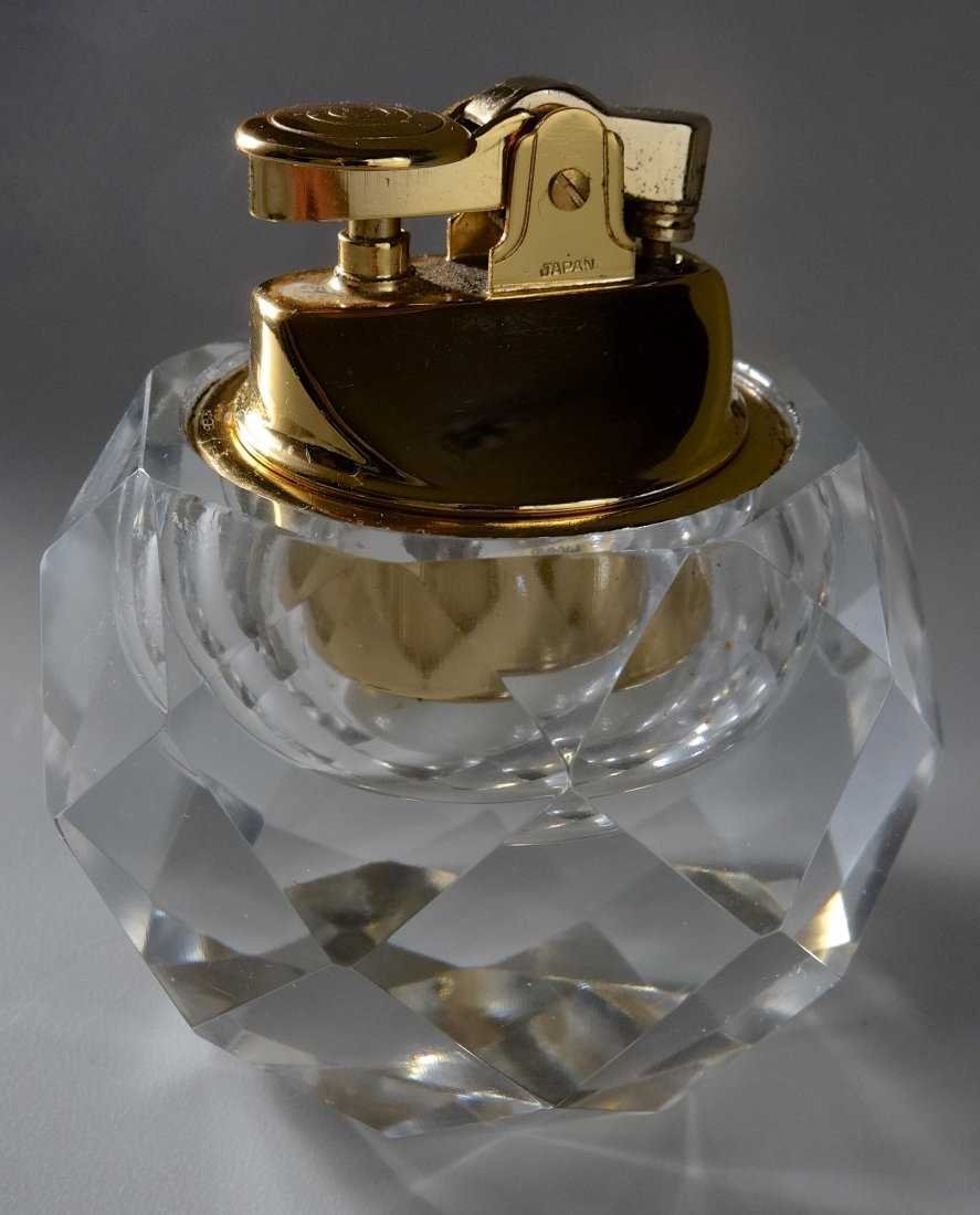 Faceted Crystal Ball Cigarette Lighter Paper Weight: Faceted Crystal Ball Tabletop Cigarette Lighter Paper Weight Approximately 3 1/4 inches tall