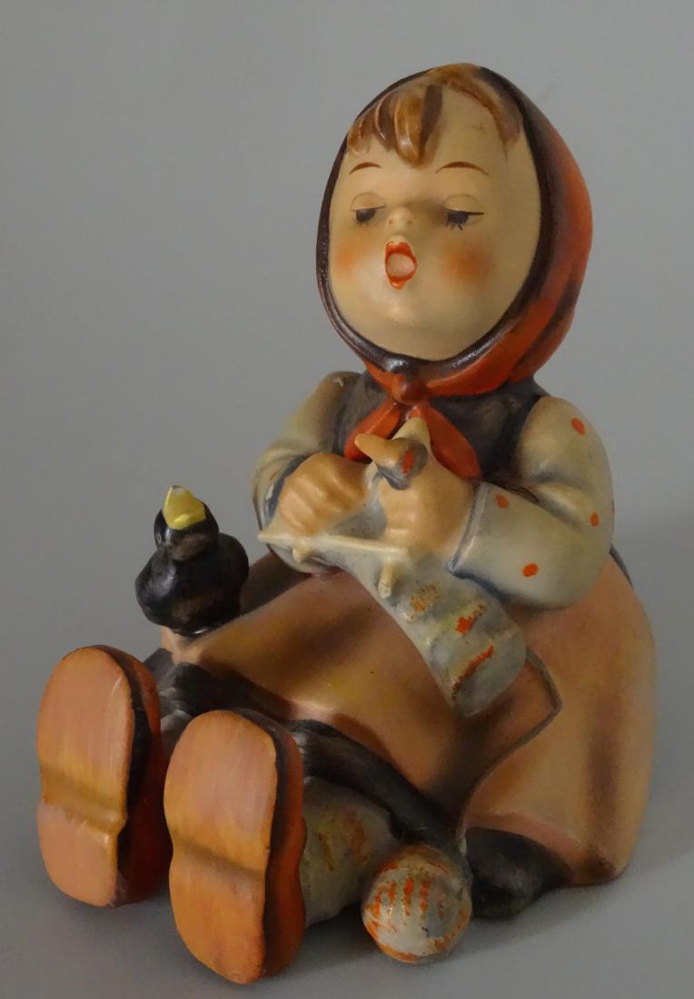 Hummel Happy Pastime 69 Figurine Girl with Bird: Hummel Happy Pastime 69 Figurine Girl with Bird Approximately 3 1/2" tall.