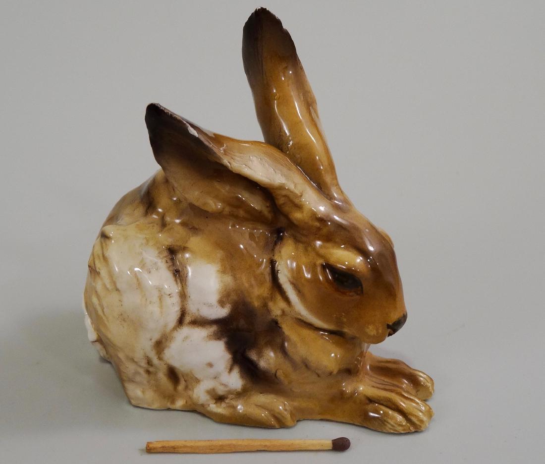 Italian Giuseppe Chiurato Majolica Hare Rabbit Figurine: Italian Giuseppe Chiurato Majolica Hare Rabbit Figurine Labeled Guiseppe Chiurato Maioliche Artistiche Roma Via Due Macelli. Approximately 3 3/8 x 2 1/8 x 3 9/16 inches high.