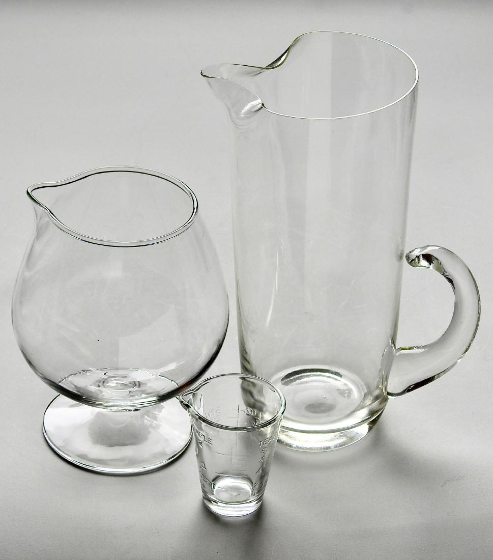 Vintage Barware Serving Clear Glass Pitchers Measuring: Vintage Barware Serving Clear Glass Pitchers Measuring Cup Approximately 8 1/4 ; 5 1/2 and 2 9/16 inches tall.