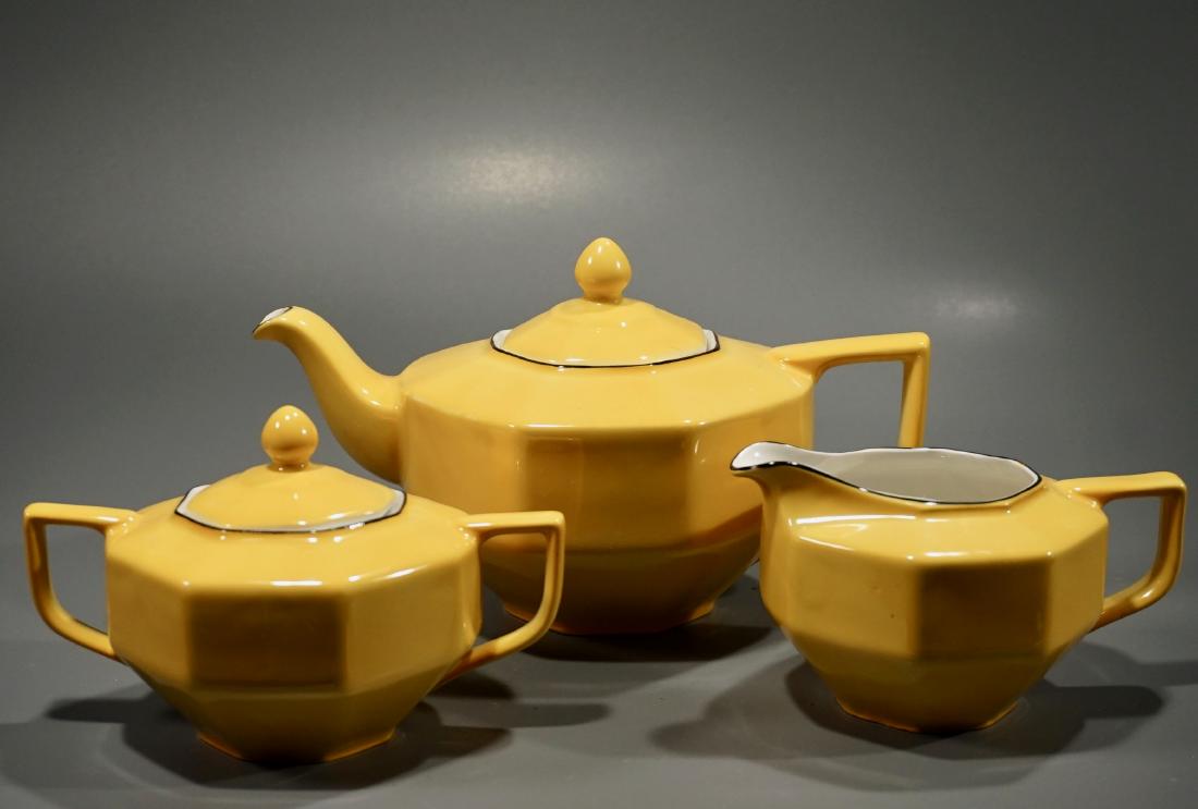 Art Deco Yellow Porcelain Tea Set Scherzer Bavaria: Art Deco Yellow Porcelain Tea Set Scherzer Bavaria Teapot is approximately 9 1/3 x 7 1/3 x 5 1/3 inches tall overall; creamer is about 5 11/16 x 3 15/16 x 3 5/16 inches tall; sugar is about 6 1/4 x 4