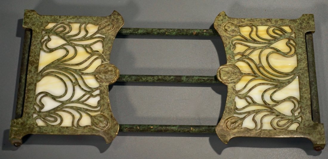 Tiffany Style Slag Glass Adjustable Bookends: Tiffany Style Slag Glass Adjustable Bookends Approximately 6 1/4 x 12 11/16 to 23 3/4 x 4 3/16 inches tall. Please check back for updates, we are adding new items daily.