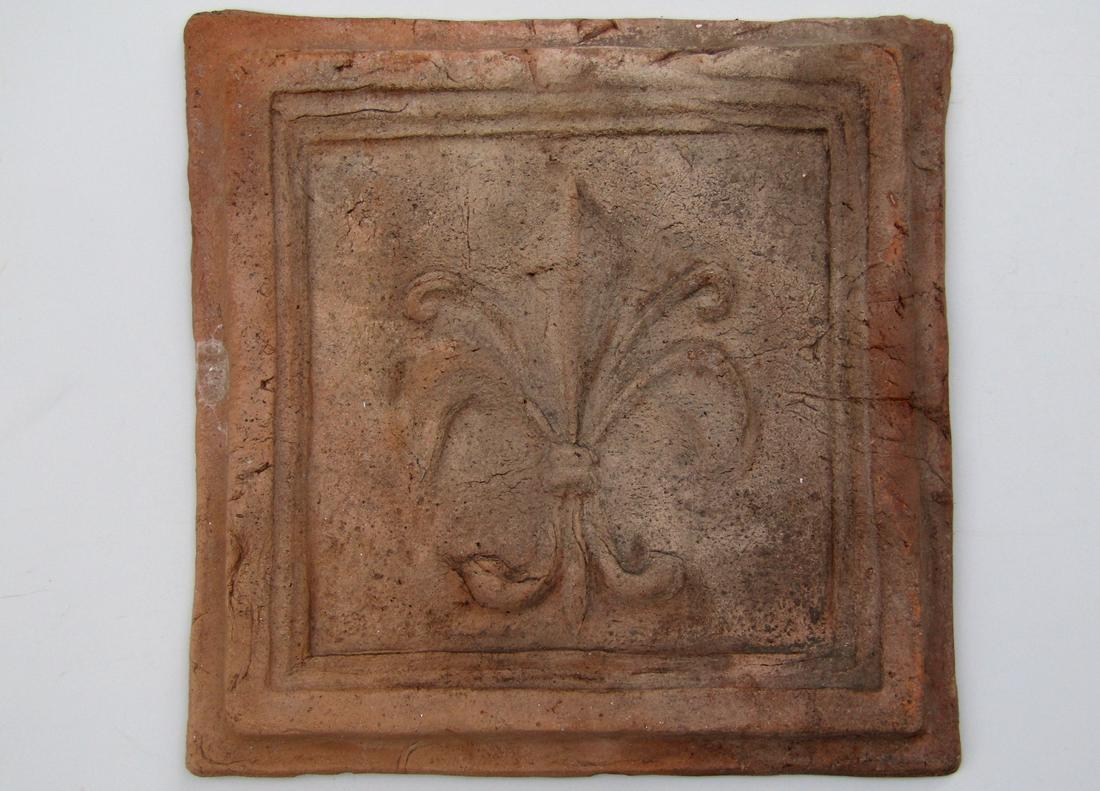 Antique Large Hand Made Terracotta Fleur de Lis Tile: Antique Large Hand Made Terracotta Fleur de Lis Tile Approximately 10 15/16 x 10 15/16 inches.