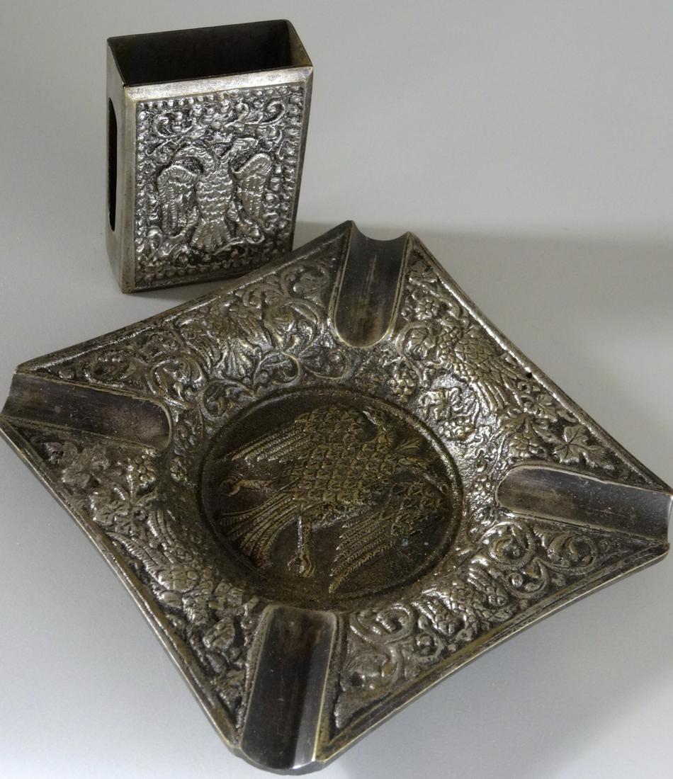 Two Headed Imperial Eagle Russian Style Ash Tray Match: Two Headed Imperial Eagle Russian Style Ash Tray Match Box Silvered Bronze Ashtray is approximately 4 1/4 inches square; matchbox is approximately 2 1/4 x 1 5/8 x 13/16 inches. Inv # 2285