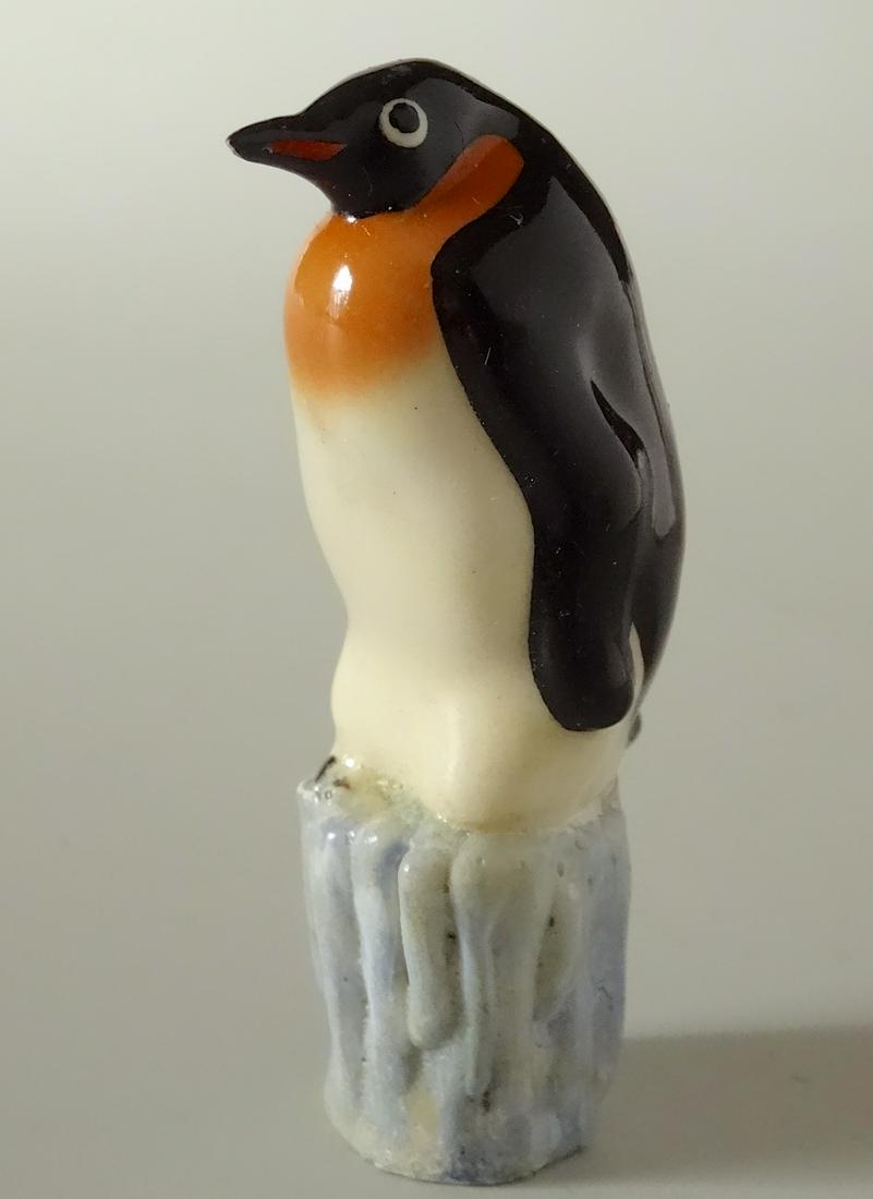 Penguin Christmas Seasonal Lamp Shade Finial: Penguin Christmas Seasonal Lamp Shade Finial Part of a large collection of unique and unusual lamp finials. Standard 1/4-27 thread would fit any standard lamp harp. Approximately 2 15/16 inches tall.