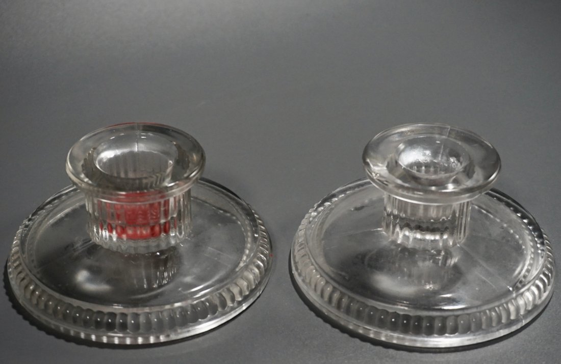 Pair Vintage Pressed Glass Candleholders: Pair Vintage Pressed Glass Candleholders Approximately 1 7/8 inches tall x 4 1/8 in diameter base.