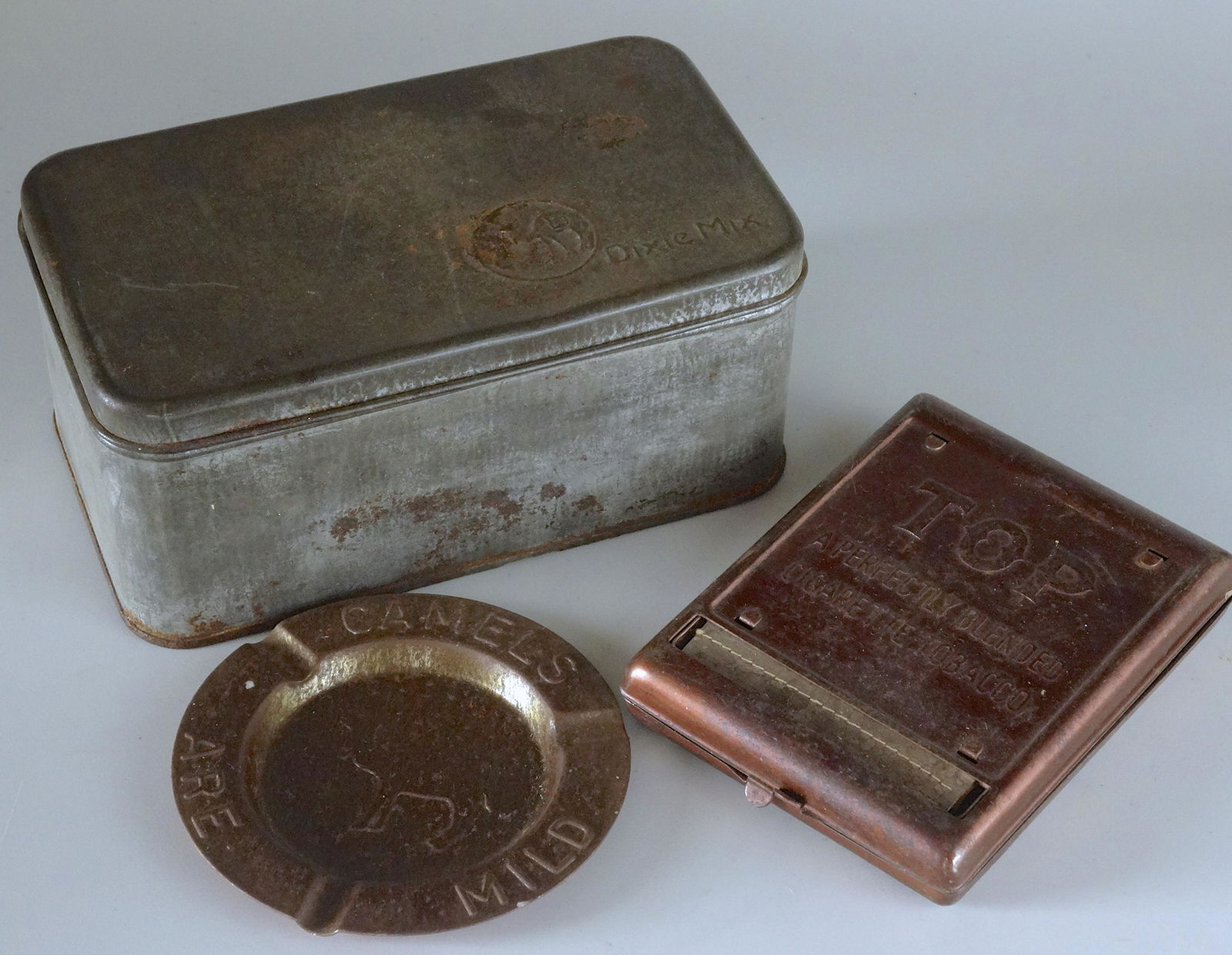 Vintage Smoking Tobacco Tins Cigarette Roller Camel Top: Vintage Smoking Tobacco Tins Cigarette Roller Camel Top Brand Box Mild Advertising Ashtray Top cigarette roller is approximately 3 1/4 x 4 3/8 x 7/8 inches ; ashtray is approximately 3 11/16 inches in