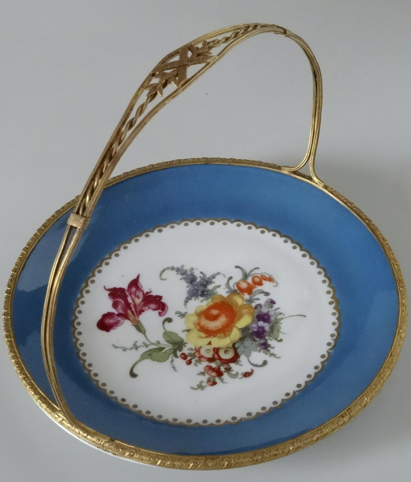 Louis XVI Ormolu Basket with Beyer & Bock Blue Flower: Louis XVI Ormolu Basket with Beyer & Bock Blue Flower Plate Approximately 8 inches in diameter and 6 3/4 inches tall.